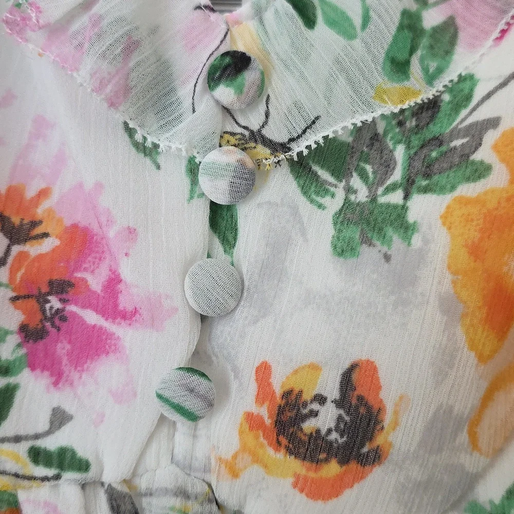 Torrid Floral with Orange and Green Accents